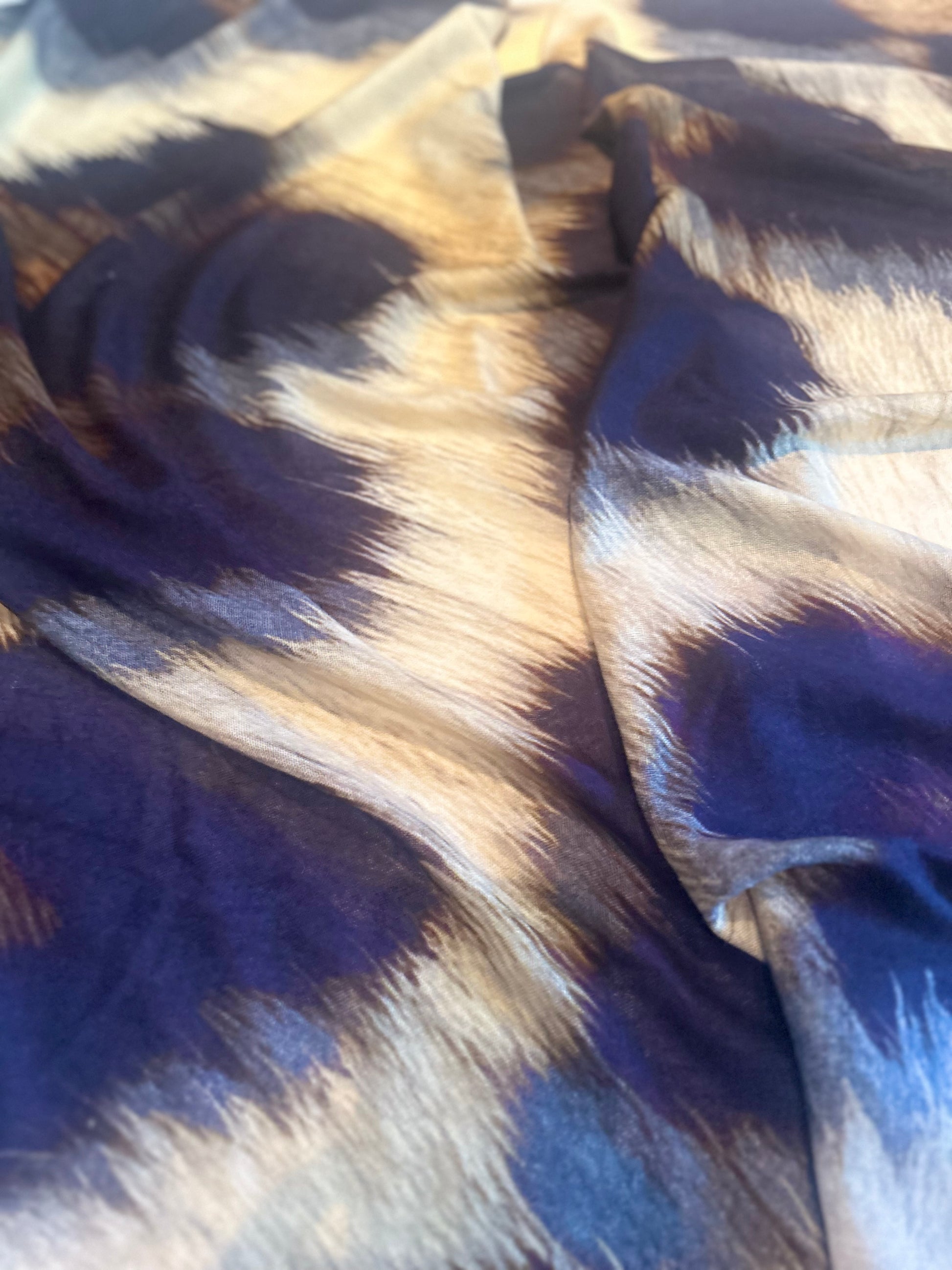 Close-up of fabric snow leopard large print