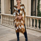 Image of woman wearing limited edition , extra large, hand tie-dyed cashmere wrap in bronze, white and brown showing unique color patterns"