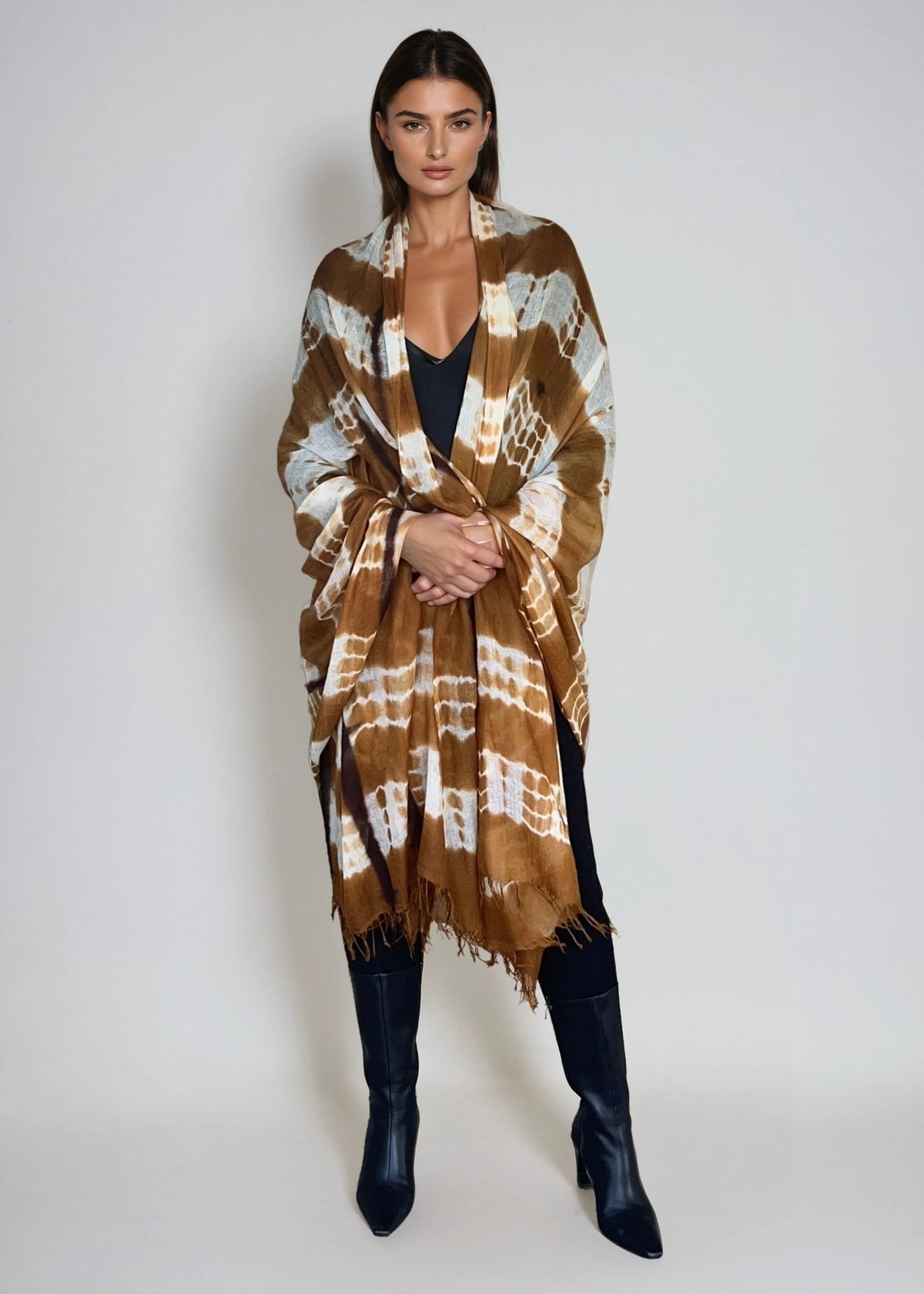 Image of woman wearing limited edition hand tie-dyed cashmere wrap in bronze, white and brown showing unique color patterns"