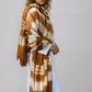 Hand-dyed bronze brown cashmere wrap styled as oversized shawl