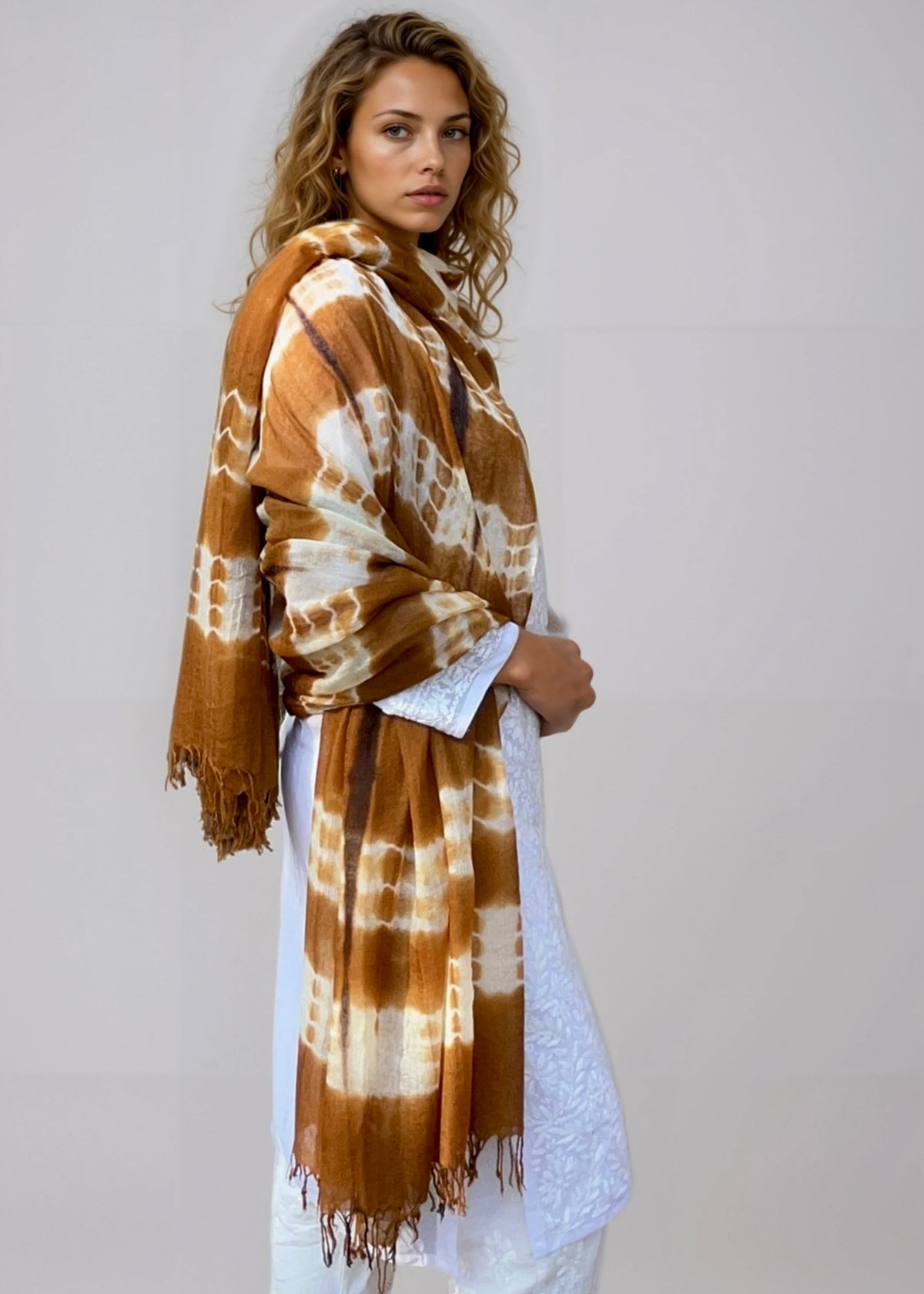 Hand-dyed bronze brown cashmere wrap styled as oversized shawl