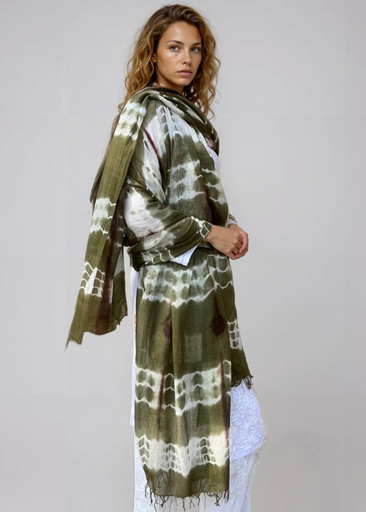 Multicolour cashmere wrap in forest green, brown and white draped as shawl