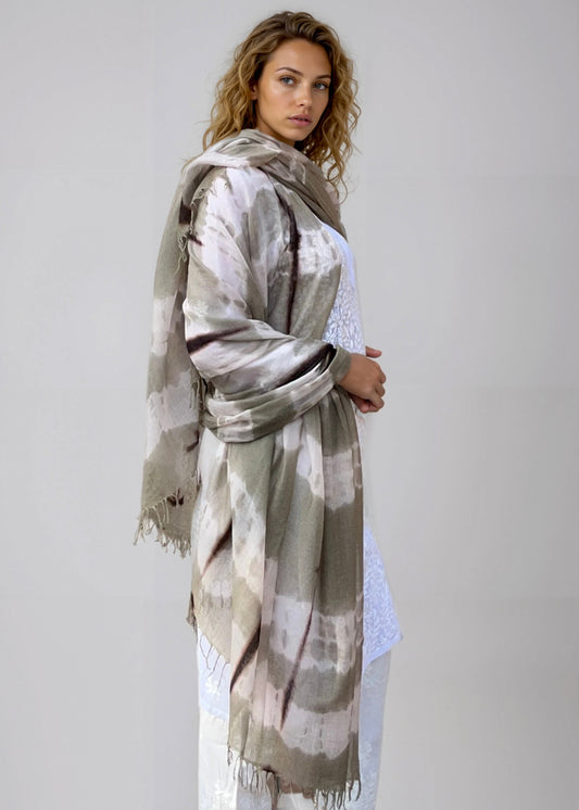 Taupe and soft pink cashmere wrap draped as oversized luxury shawl